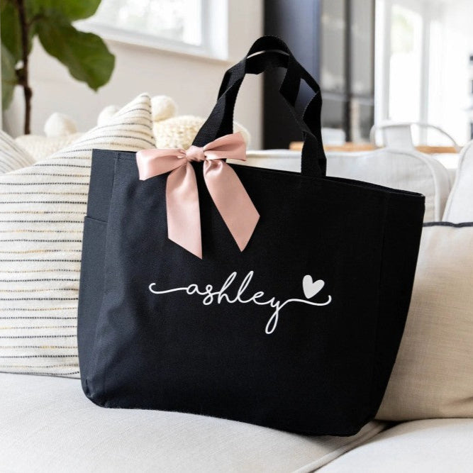 A black monogrammed tote gift for bridesmaids