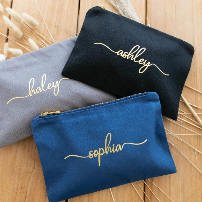 Assortment of custom cosmetic pouches bridal party gifts