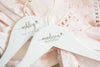 custom bridesmaid hangers with name and heart icon