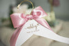 custom bridesmaid hangers with name and heart icon
