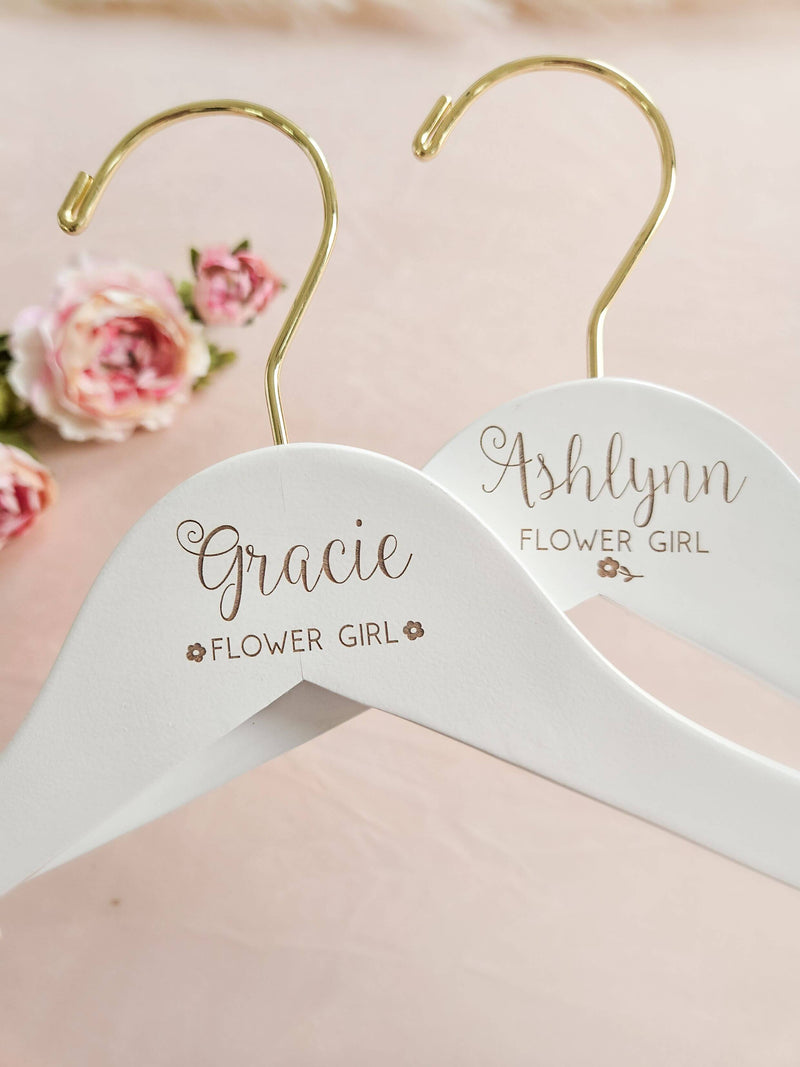 flower girl hanger with engraved name and flower icons