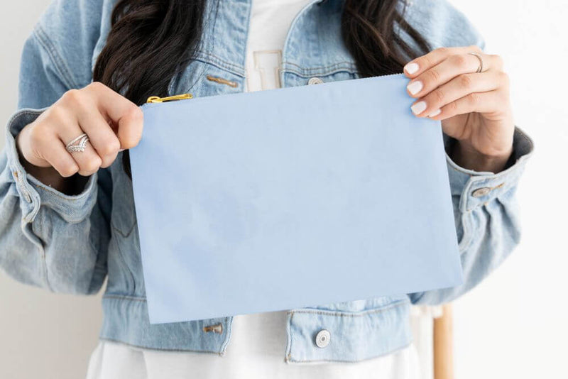 light blue canvas cosmetic bag