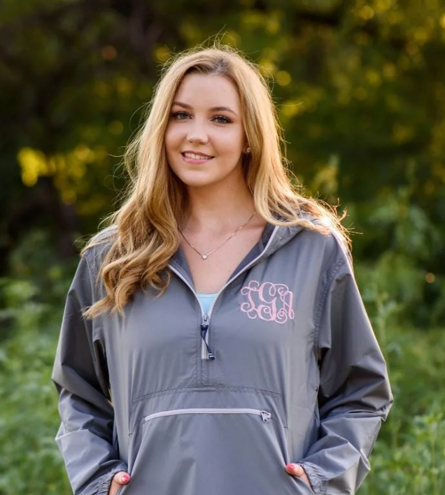 girl wearing a personalized rain jacket