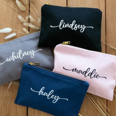 An array of colorful personalized travel cosmetic bags