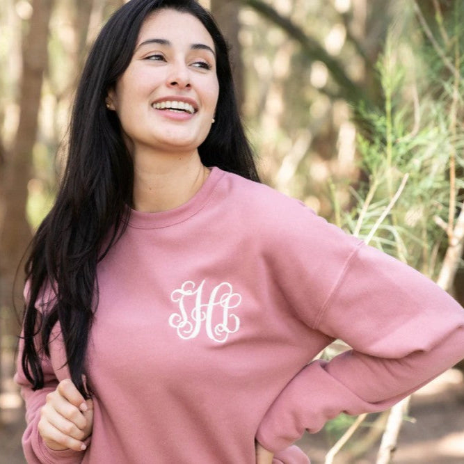 Woman in pink monogrammed clothing
