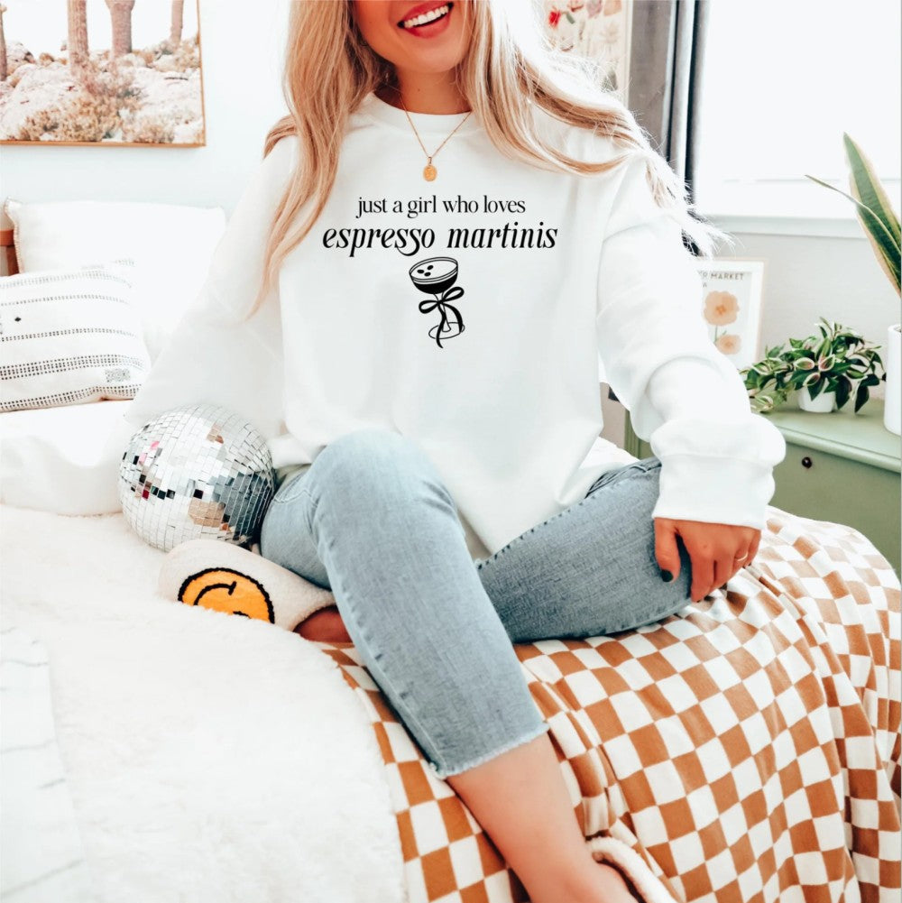Woman in a white espresso martini sweatshirt